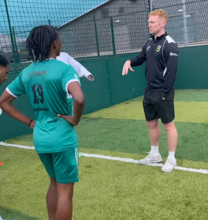 An ISA athlete receiving instruction from a professional coach